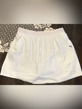 Puma White Women's Tennis/golf Skort with Black Logo.